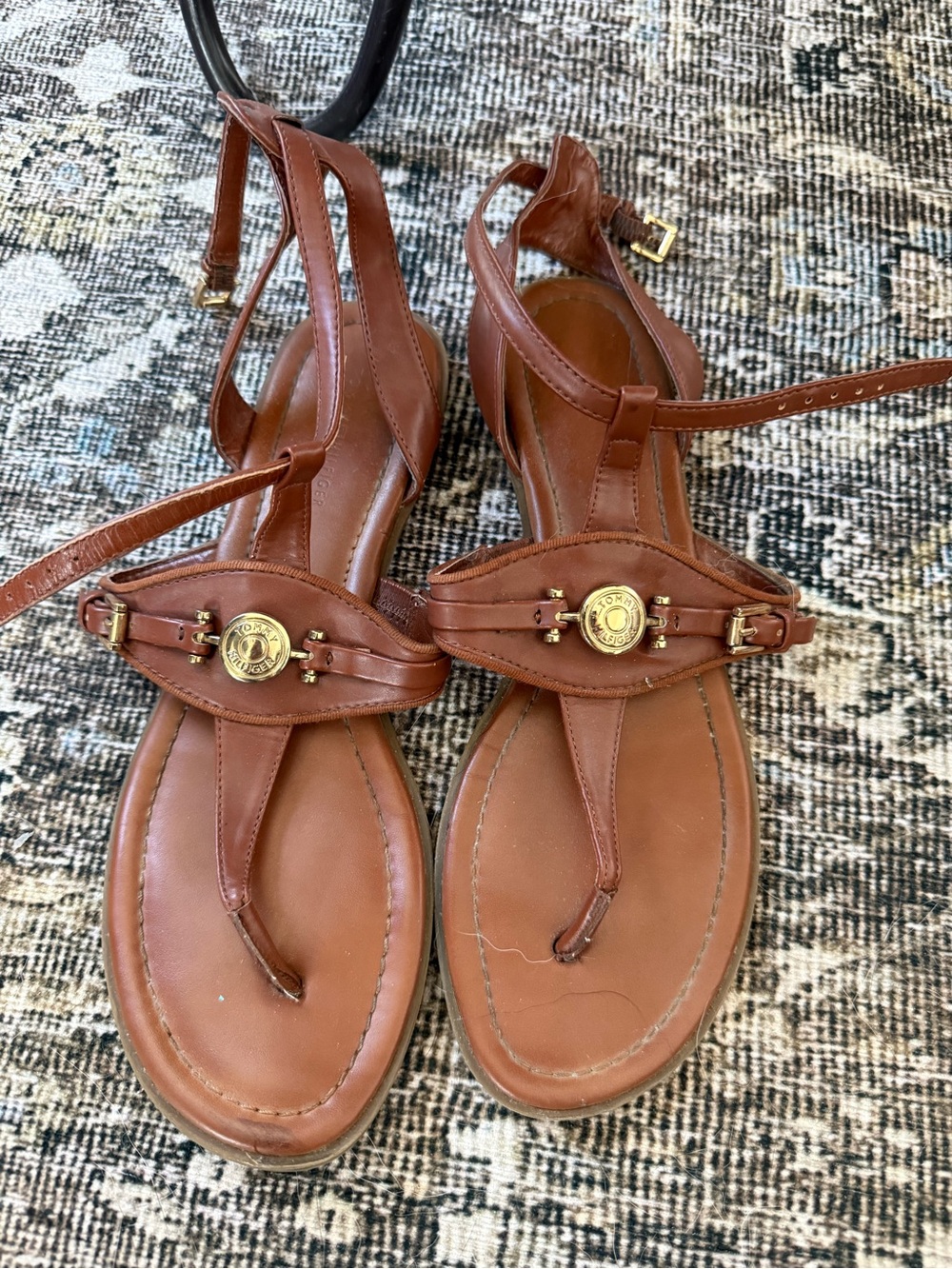 Tommy Hilfiger Brown Leather T-Strap Sandals with Gold Logo Accent